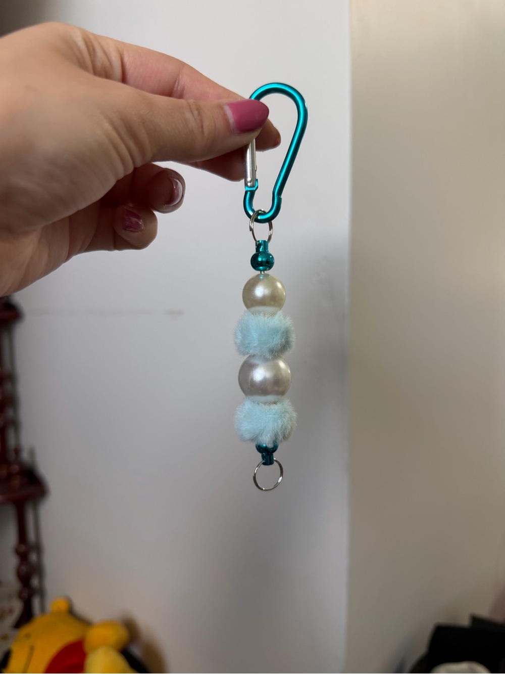 Teal Carabiner Keychain with Pearl Beads and Light Blue Fur Pom Accents
